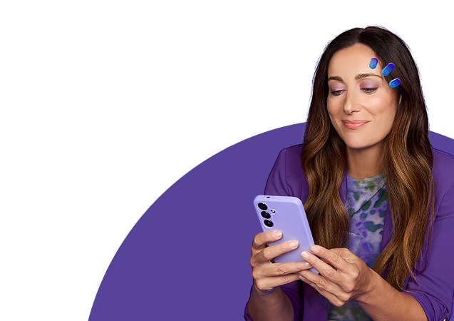 Woman in purple holding eye drops