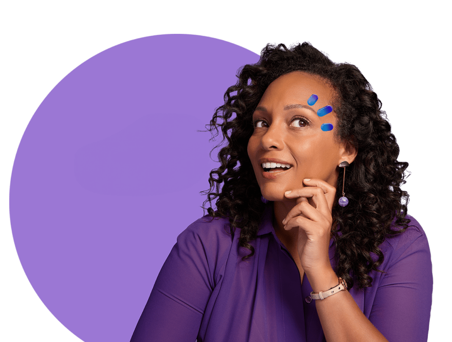Woman smiling with hand resting on chin with three drops above her eye